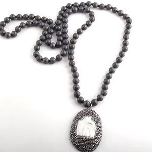 Elegant Black Beaded Necklace with Silver Pendant